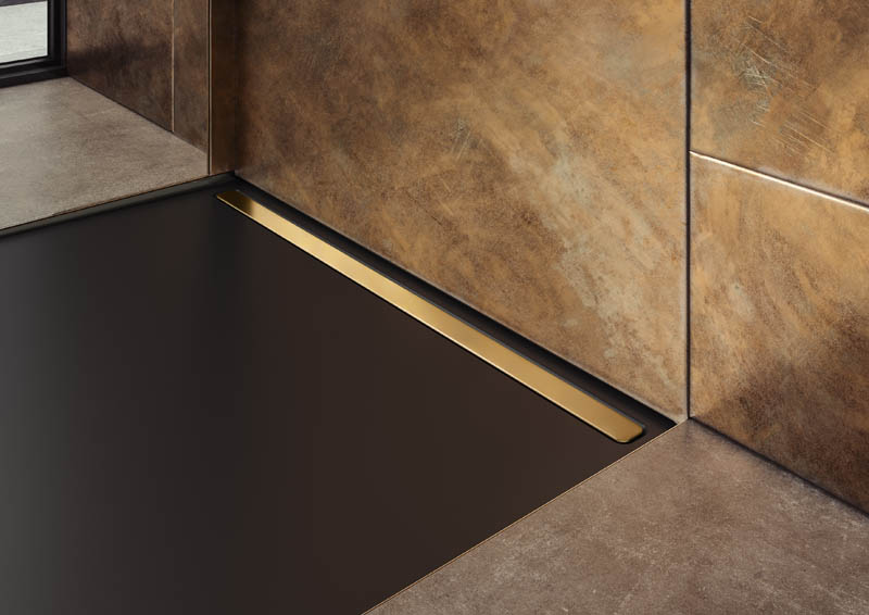 NEXSYS-Duschfläche in schwarz mit Duschblende in Gold glänzend